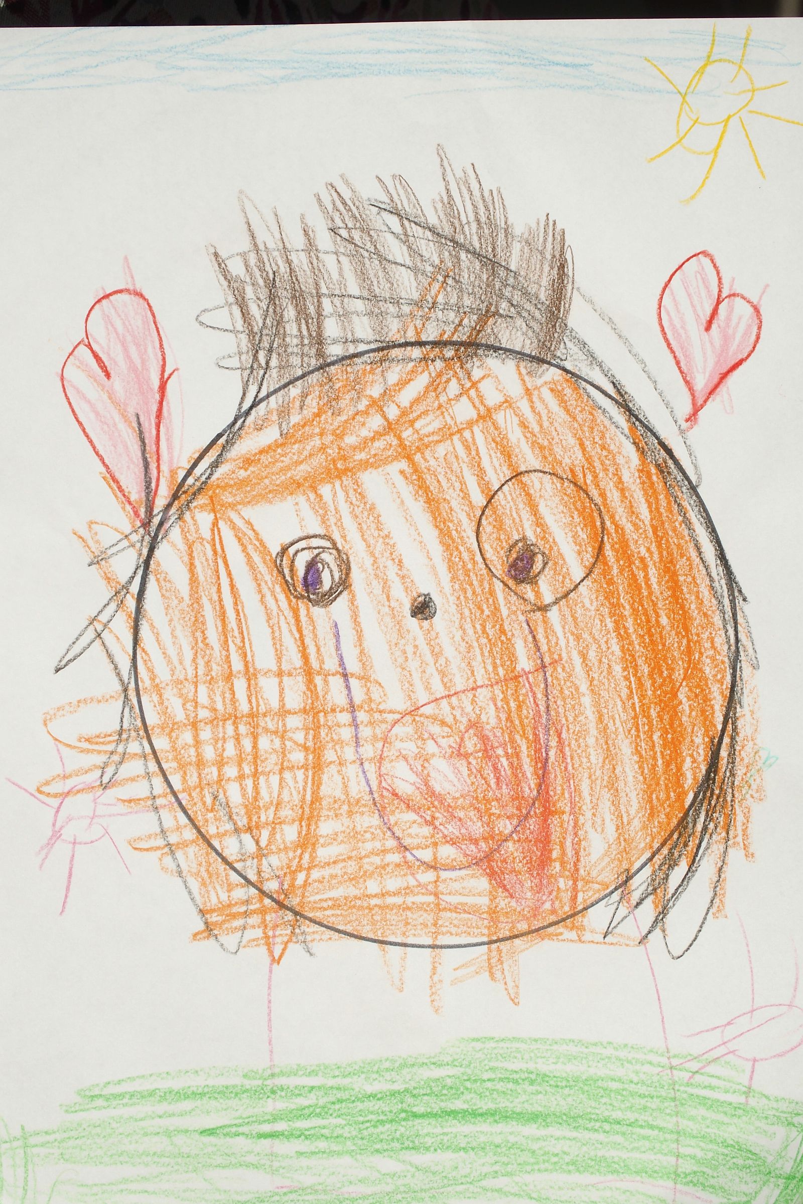 eine Kinderzeichnung von Bella Ball mit Herzchen